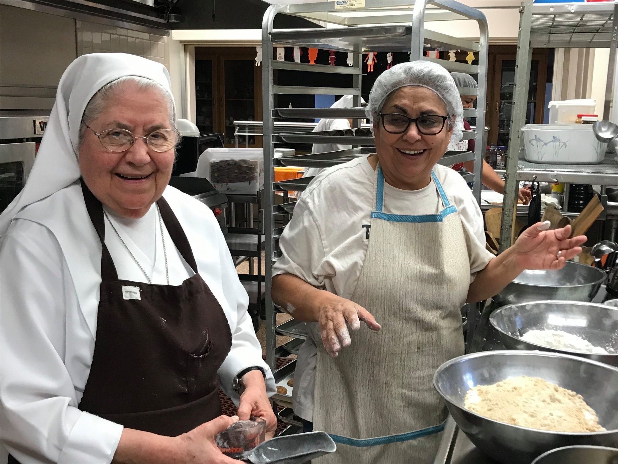 Sisters in kitchen